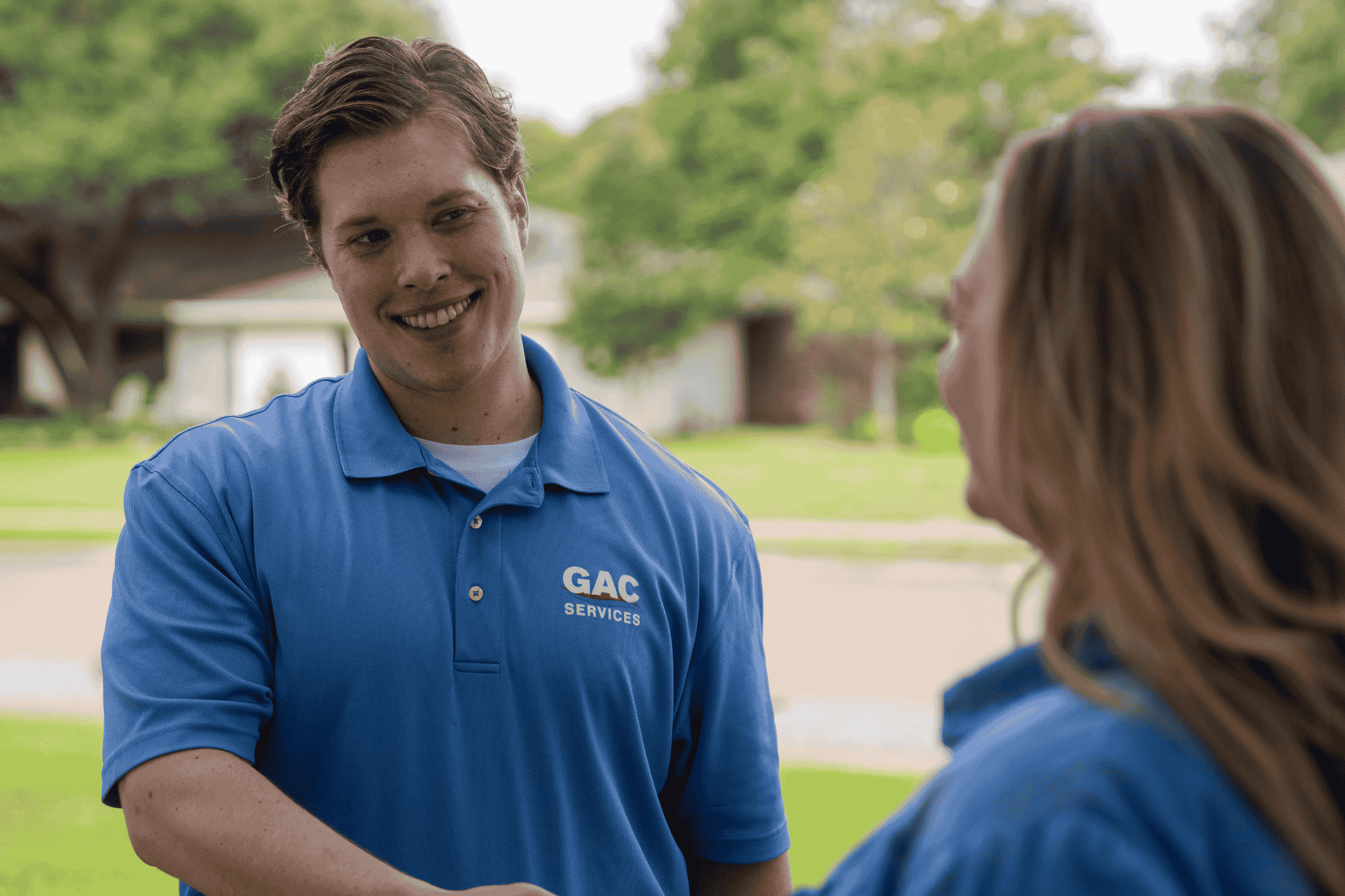 Technician shaking customer's hand